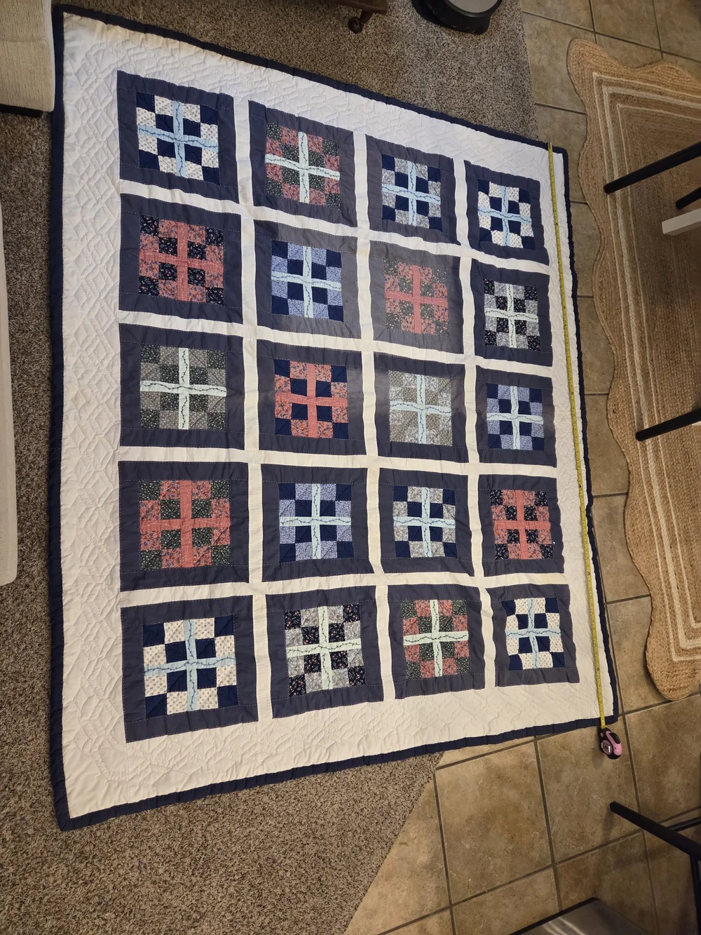 Patchwork Navy and Cream Quilt with Blue and Coral Accents